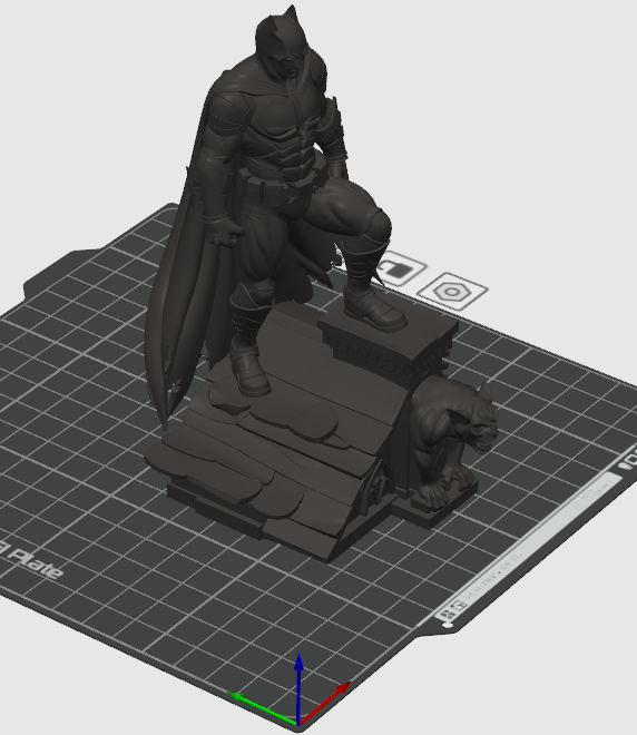 Batman on rooftop pedestal