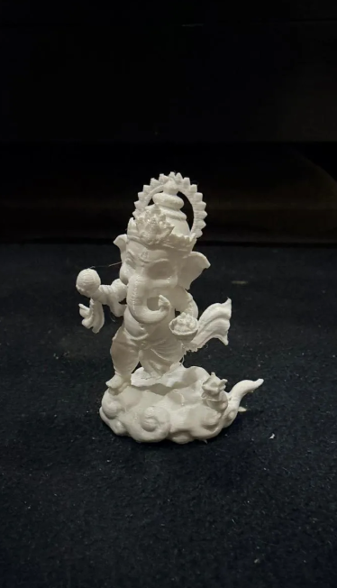 Lord Ganesha With Ladoo